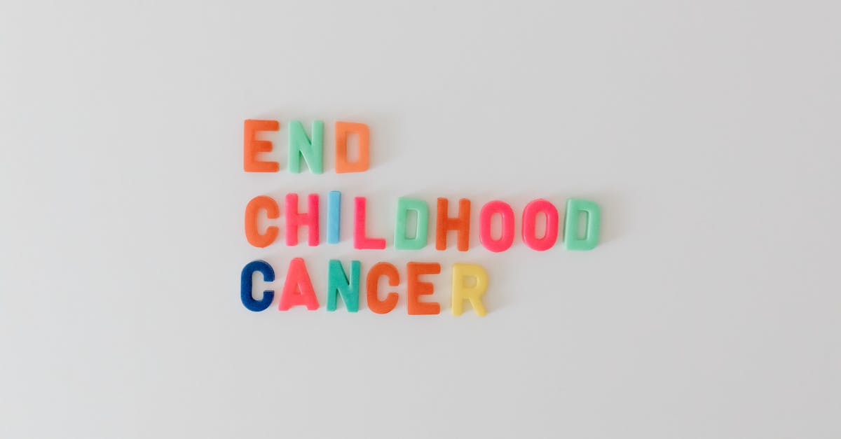 Multicolored letters spell out 'end childhood cancer,' symbolizing a call for awareness and action in the fight against pediatric cancer.